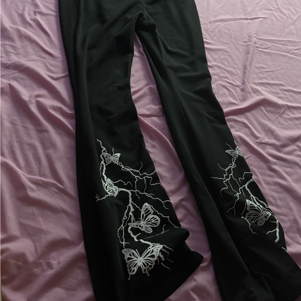 SHEIN Black Flare Pants with White Butterfly Design